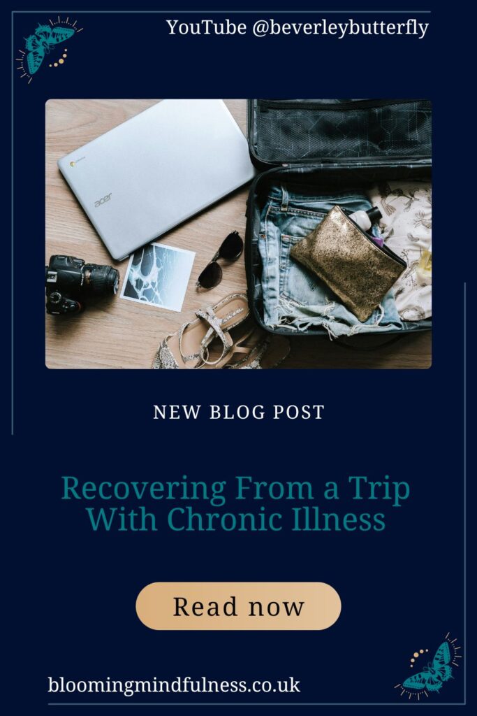 an open suitcase is seen, beside it is a laptop, sunglasses, a picture of the sea, a camera and a pair of sandals to represent recovering from a trip with chronic illnesses