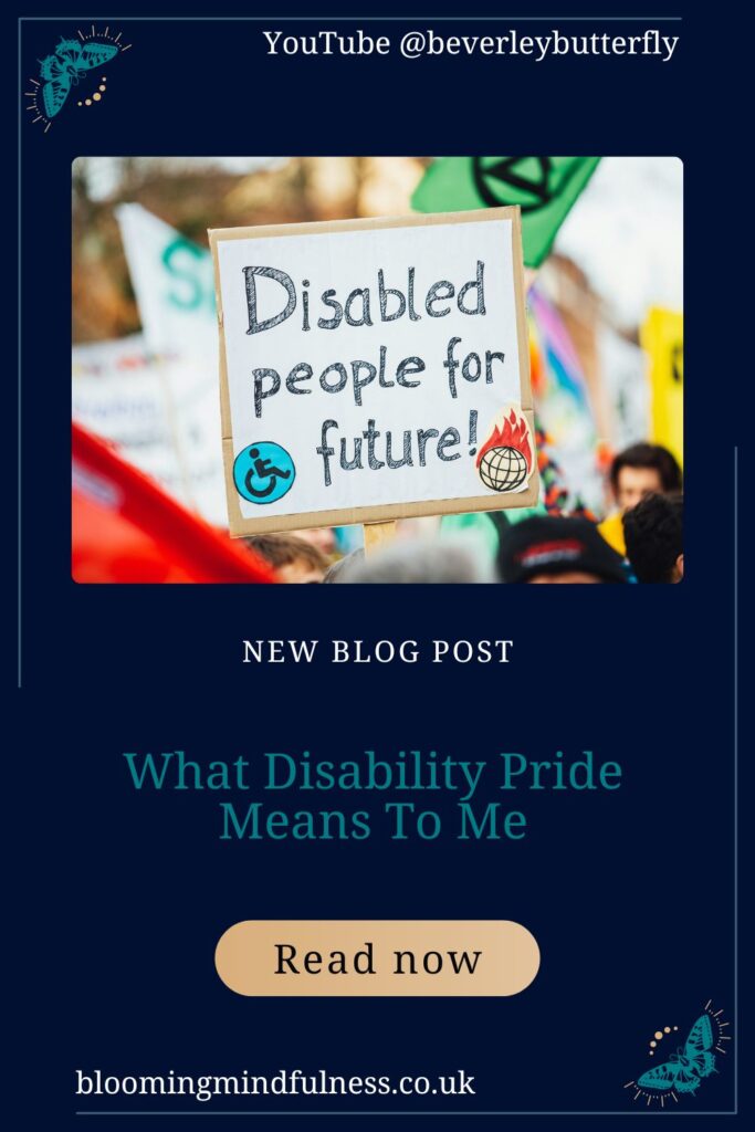 A banner at what looks like a parade or protest that says 'Disabled people for future' to represent What Disability Pride Means To Me
      